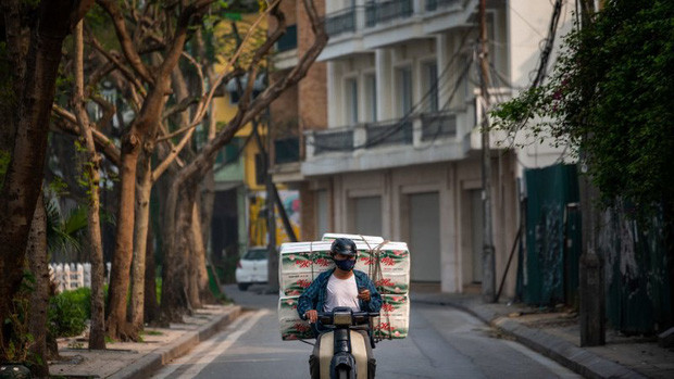 Báo Anh: Việt Nam đã chống dịch rất thành công, và giờ cả thế giới sẽ dõi theo họ chống lại làn sóng Covid-19 mới như thế nào - Ảnh 2.