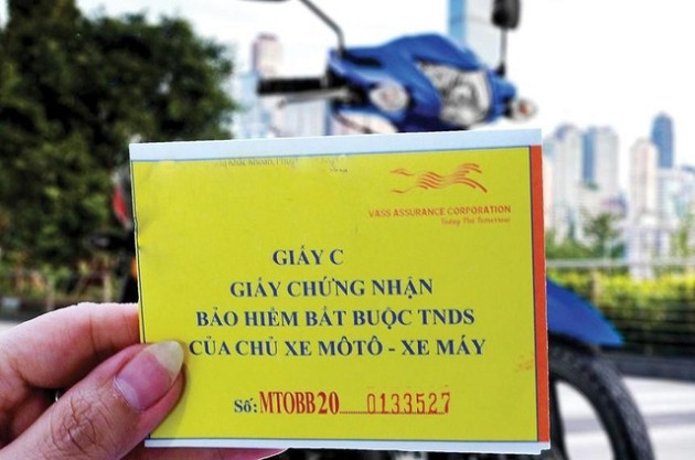 Bảo hiểm xe máy nên chuyển từ bắt buộc sang tự nguyện - Ảnh 1.