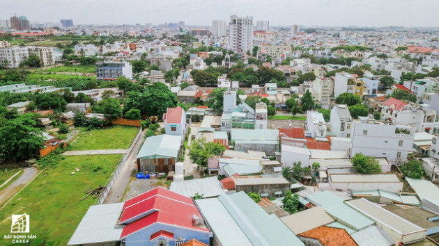 Cận cảnh dự án khu dân cư Bắc Rạch Chiếc bỏ hoang gần 20 năm ở trung tâm TP.HCM - Ảnh 1.