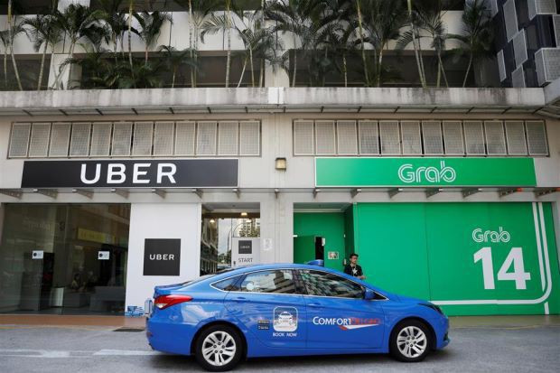 Cho rằng thỏa thuận Grab-Uber gây thiệt hại cho người tiêu dùng, Singapore đề xuất các hình phạt mạnh tay - Ảnh 2.