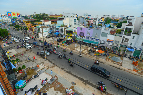 Chuyên gia nói gì về việc thu hồi đất và bán đấu giá tại Tp.HCM? - Ảnh 1.