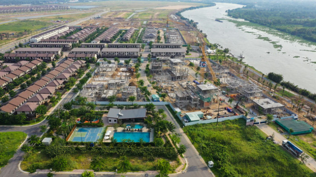 Cuộc đổ bộ của các ông lớn BĐS về các tỉnh lân cận Sài Gòn - Ảnh 2.