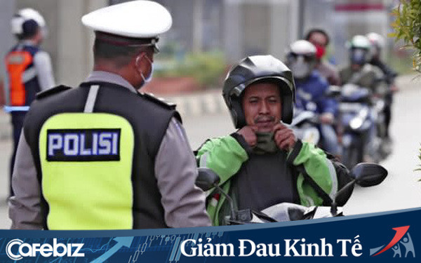  Grab và Gojek đốt tiền cứu tài xế - Ảnh 1.