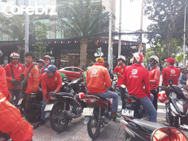 Hàng trăm tài xế đình công phản đối chính sách của Go-Việt: “Chúng tôi làm 17-18h/ngày cũng không đủ điểm để đạt mức thưởng đưa ra” - Ảnh 4.