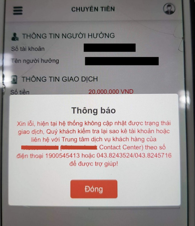 Khốn khổ ngày Tết vì ATM hết tiền, chuyển khoản nghẽn, hotline quá tải - Ảnh 1.