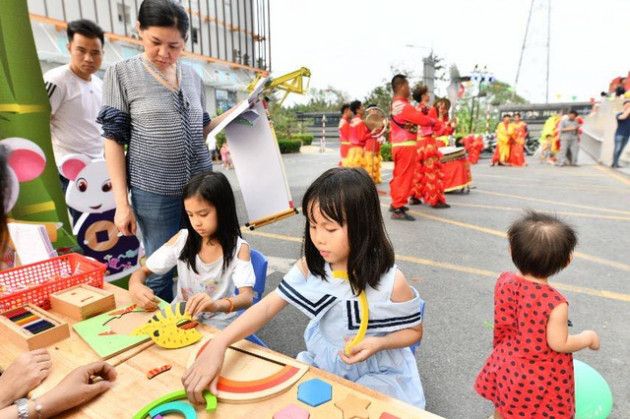 Khu đô thị, chung cư rộn ràng tràn ngập sắc xuân đón Tết Canh Tý - Ảnh 12.