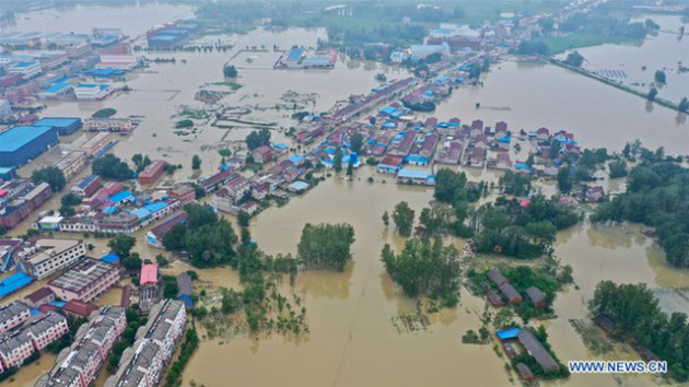 Mưa lũ ở Trung Quốc: Vài ngày lại có kỷ lục mới, người dân bất ngờ và nỗi lo mất trắng - Ảnh 1.