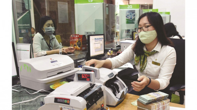 Ngân hàng đã cố gắng hết sức hỗ trợ doanh nghiệp - Ảnh 1.