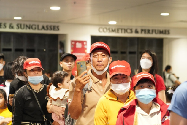 Những chuyến bay yêu thương Vietjet đưa người lao động về quê đón Tết - Ảnh 4.