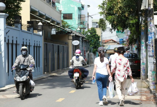  Những tuyến hẻm, con đường khang trang ở TPHCM nhờ người dân hiến đất mở rộng - Ảnh 1.