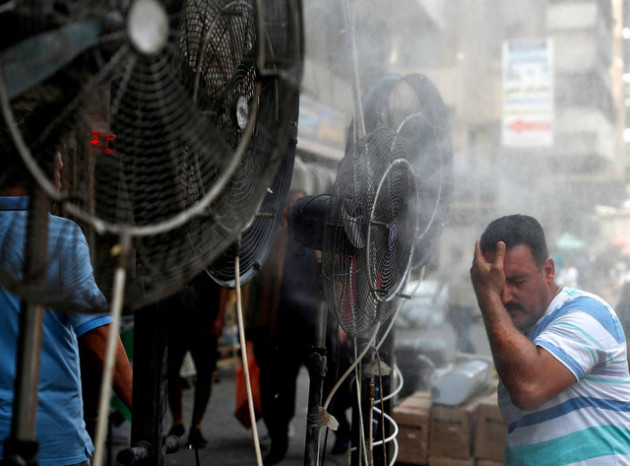 Nợ tiền điện mãi không trả, Iraq bị ‘hàng xóm’ Iran cắt điện ngay giữa cái nóng 50 độ C - Ảnh 1.