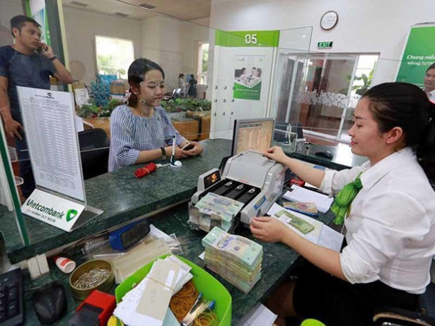 Phía sau lợi nhuận khủng của các ngân hàng