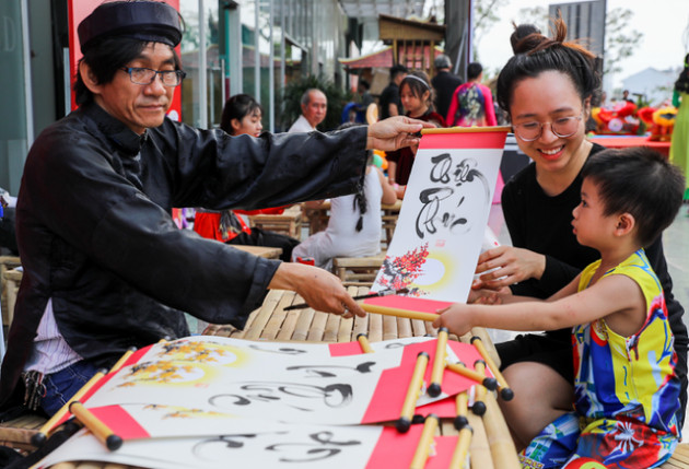 Rộn ràng Tết Việt ở chung cư, khu đô thị - Ảnh 6. Rộn ràng Tết Việt ở chung cư, khu đô thị - Ảnh 6.
