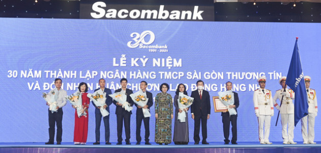 Sacombank đón nhận Huân chương Lao động hạng Nhì vào dịp kỷ niệm 30 năm thành lập - Ảnh 1.