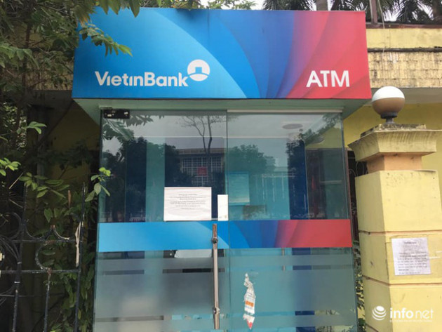 Tái diễn tình trạng ATM tê liệt, ngừng hoạt động... trong ngày cận Tết - Ảnh 2.