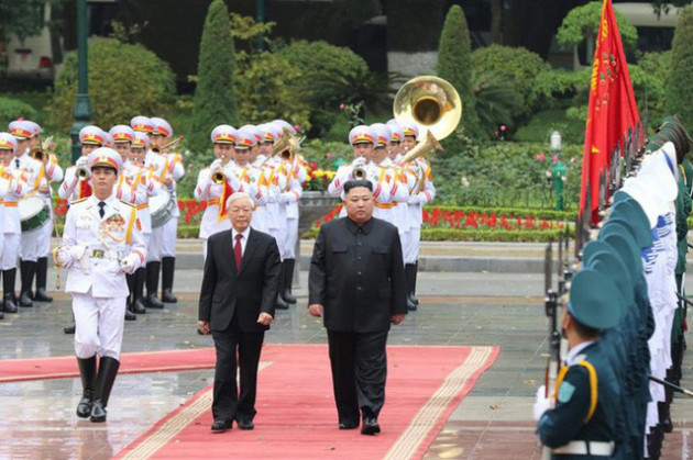 Toàn cảnh chuyến thăm chính thức Việt Nam của Chủ tịch Kim Jong Un qua ảnh - Ảnh 3.