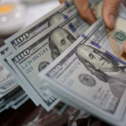 Tỷ giá trung tâm giảm mạnh bất chấp đồng USD đi lên