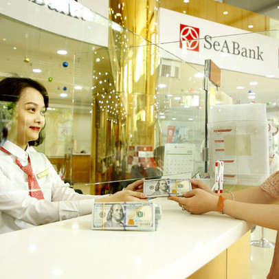 Tỷ giá trung tâm tăng mạnh, USD tự do tiếp tục giảm sâu