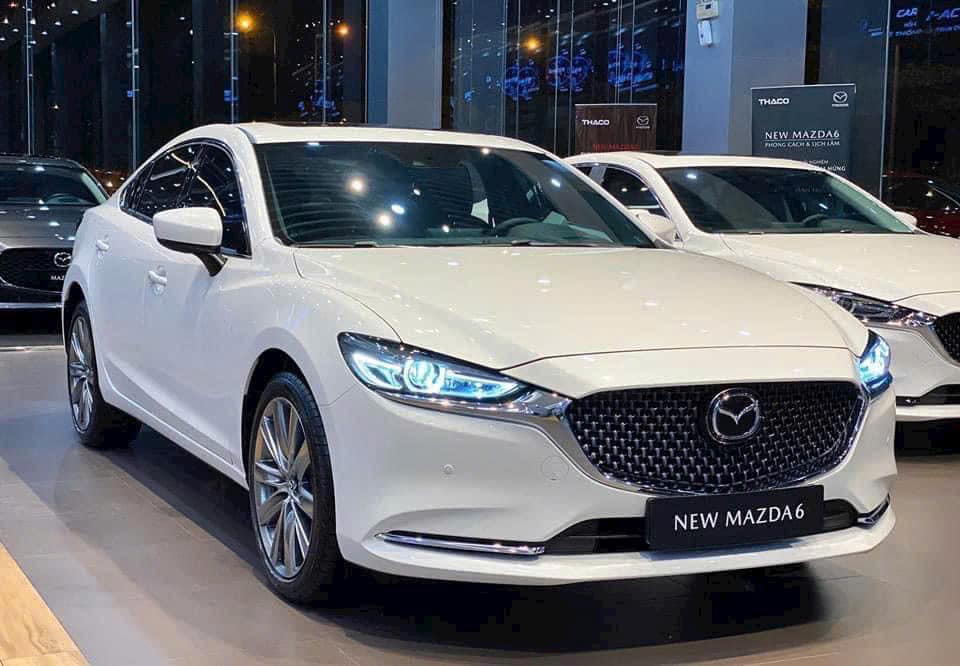 Mazda6 'dọn kho', giảm giá tới 65 triệu tại đại lý: Bản tầm trung giá chưa đến 750 triệu, cạnh tranh Camry với giá tiệm cận Mazda3 - Ảnh 1