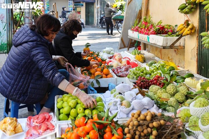 Hơn nửa triệu đồng một con gà ngậm hoa hồng cúng rằm tháng Chạp - Ảnh 20