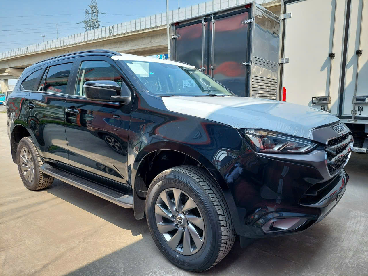 Isuzu mu-X giảm giá 220 triệu tại đại lý: Bản tầm trung chỉ còn 930 triệu, tiệm cận Peugeot 2008 - Ảnh 5