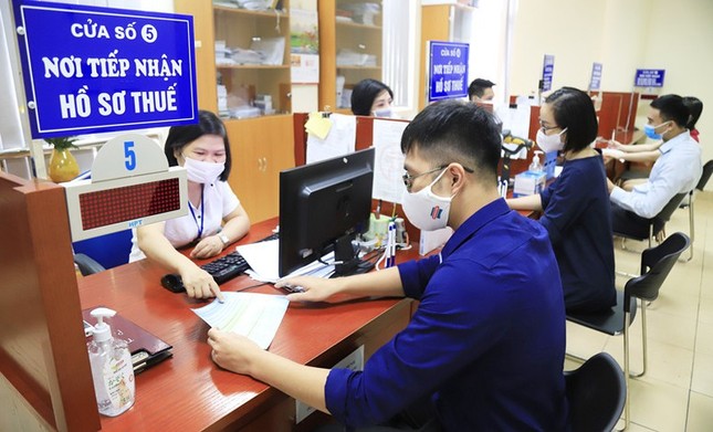 Quy định mới về giá điện, đăng ký thuế từ tháng 2 - Ảnh 2