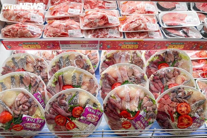 Siêu thị lại đầy ắp hàng hóa sau kỳ nghỉ Tết Nguyên đán Ất Tỵ - Ảnh 7