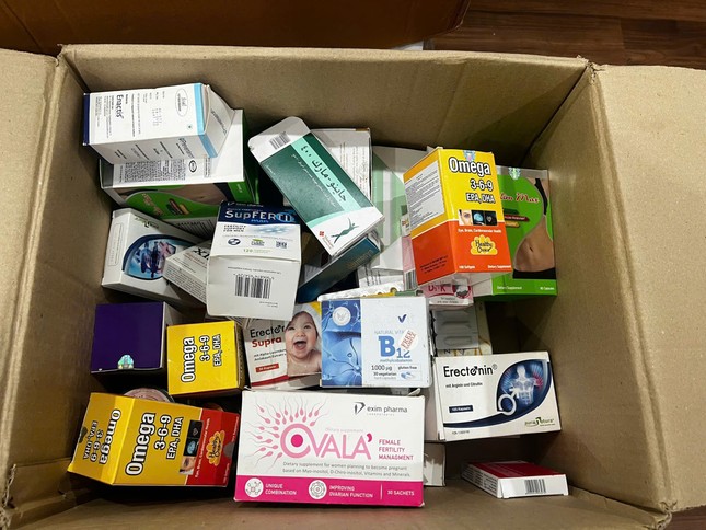 Công an Hà Nội thu giữ hơn 100 tấn hàng hóa thực phẩm chức năng, thiết bị y tế giả - Ảnh 1