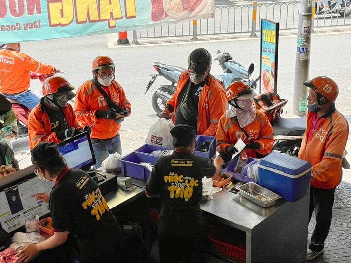 Grab và Shopee sắp không còn độc chiếm 'miếng bánh' giao đồ ăn - Ảnh 1