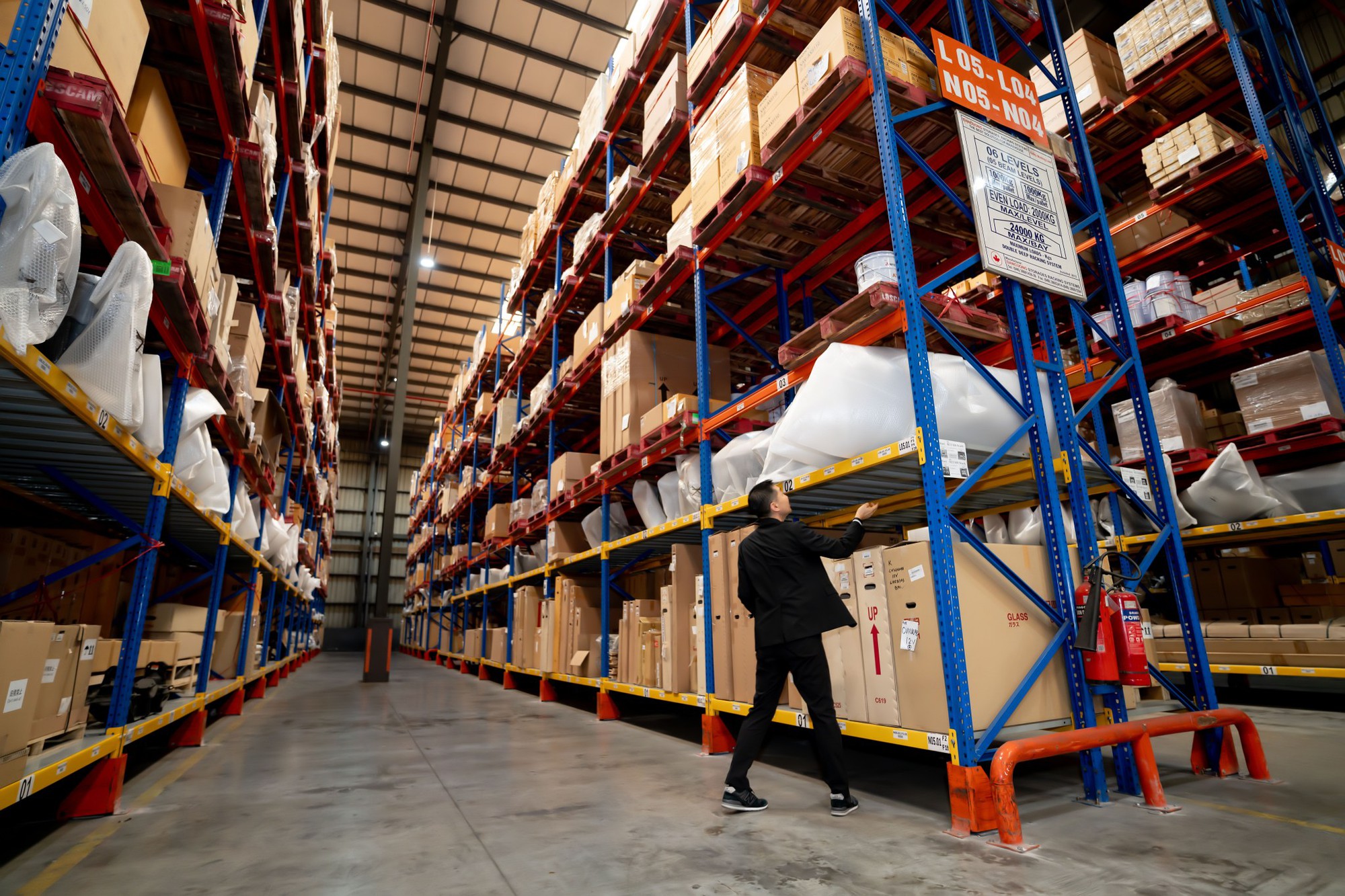 Từ nay, sửa chữa, bảo dưỡng xe Mitsubishi tại miền Nam sẽ tiện hơn rất nhiều: Kho phụ tùng mới rộng 3.500m2, tăng 60% sức chứa - Ảnh 1