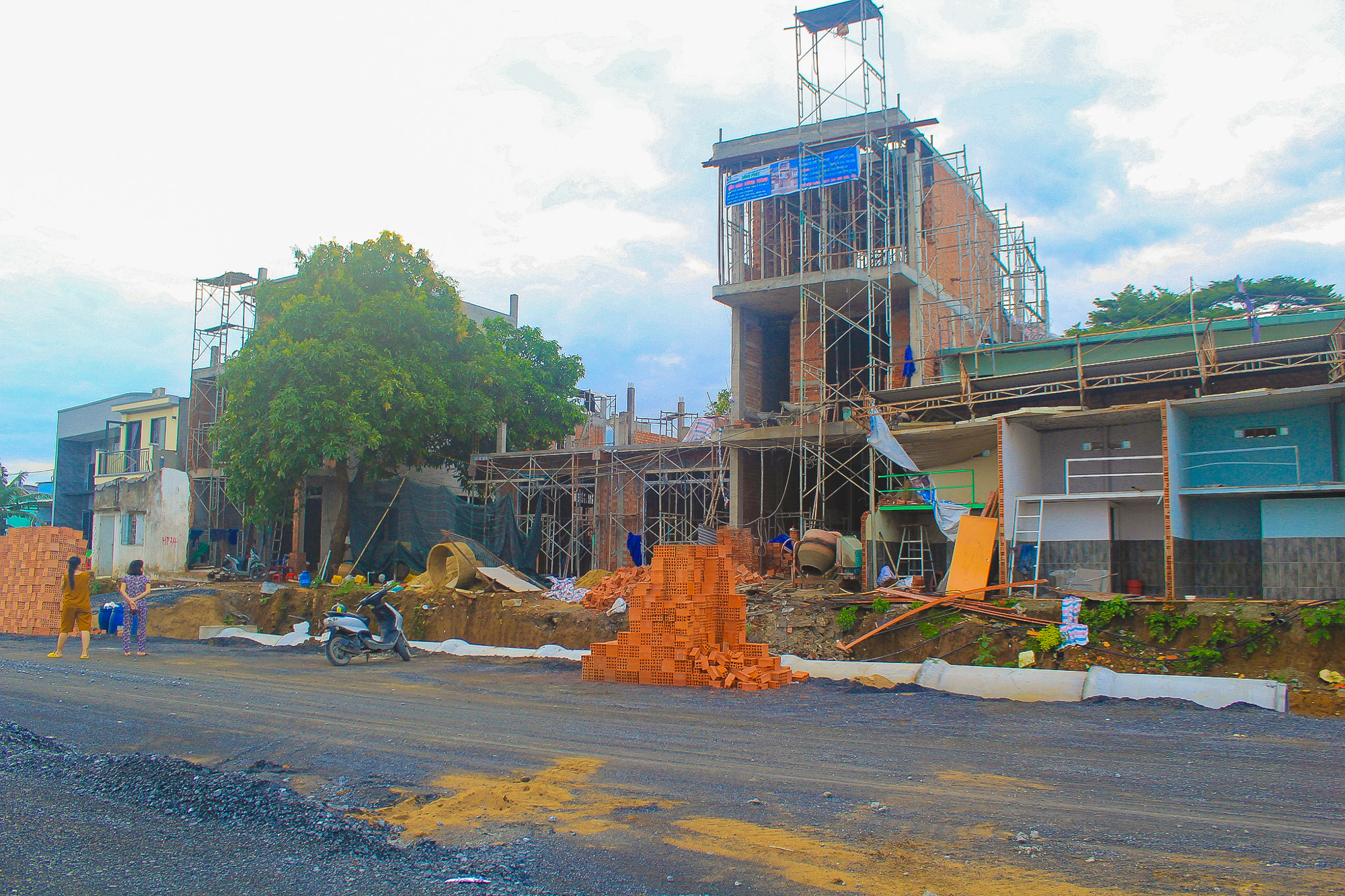 Ngắm đường ven sông trị giá gần 2.000 tỷ sắp thông xe: Cách TP.HCM một cây cầu, đẩy giá đất lên đến 200 triệu đồng/m2 - Ảnh 9