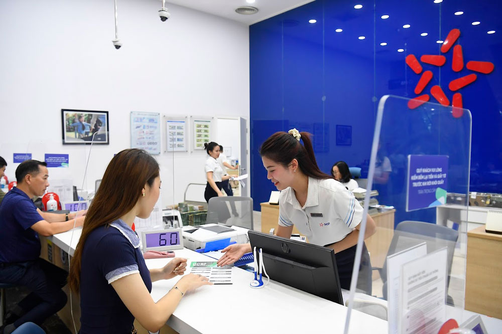 Tiếp tục bơm vốn ra nền kinh tế - Ảnh 1