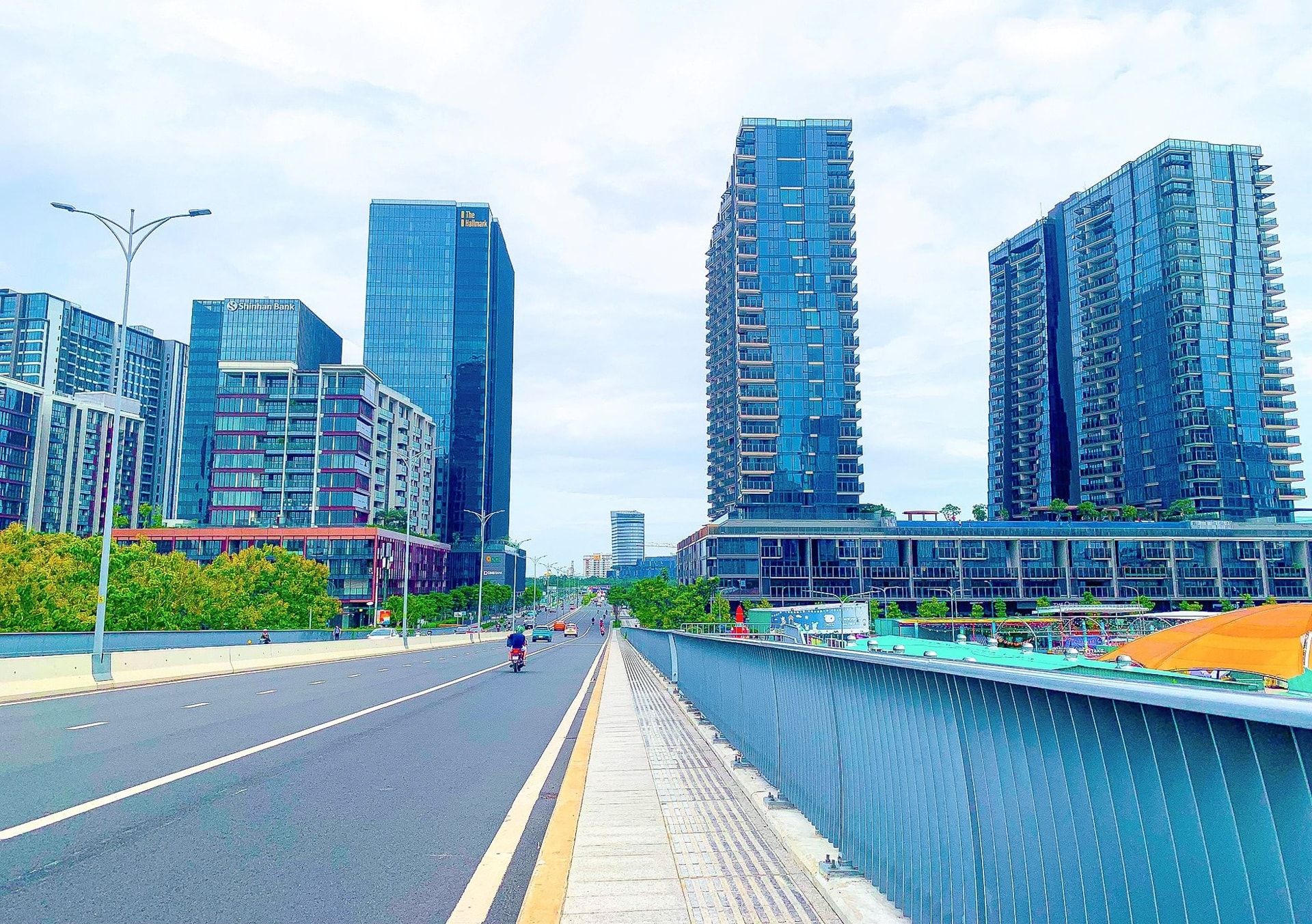 Thị trường bất động sản Hà Nội và TP.HCM "tăng nhiệt" - Ảnh 1