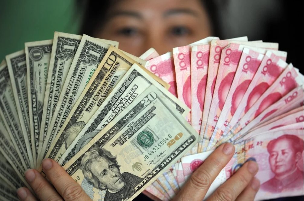 10 năm sau quyết định gây chấn động thế giới, Trung Quốc tính nước cờ gì cho cuộc chơi quyền lực đồng tiền? - Ảnh 1