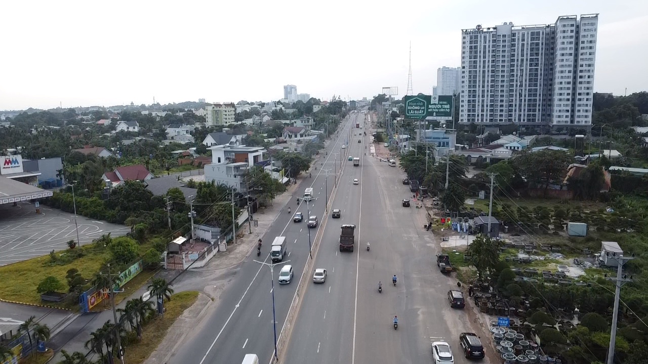 Cận cảnh dự án nâng cấp, mở rộng Quốc lộ 13 sau hơn 3 năm khởi công - Ảnh 1