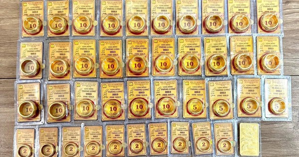 Giá vàng trên đỉnh cao, tỷ giá 'hạ nhiệt'
