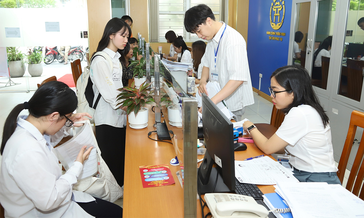 Nguyên Thứ trưởng Nội vụ: Một cán bộ xã có thể đảm nhận nhiều vị trí việc làm - Ảnh 1