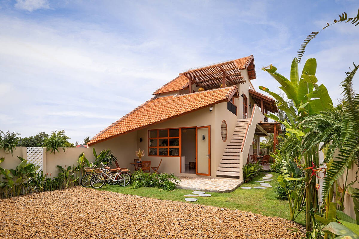 Ngôi nhà chạm vào ký ức bằng ngôn ngữ kiến trúc bản địa - Ảnh 2