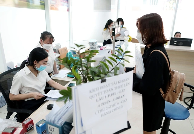 Đề xuất bỏ thuế suất 35% với người nộp thuế thu nhập cá nhân - Ảnh 1