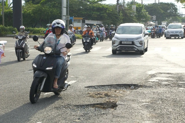 Vá đường, hầm chui Nguyễn Văn linh ngay trong tuần này - Ảnh 2