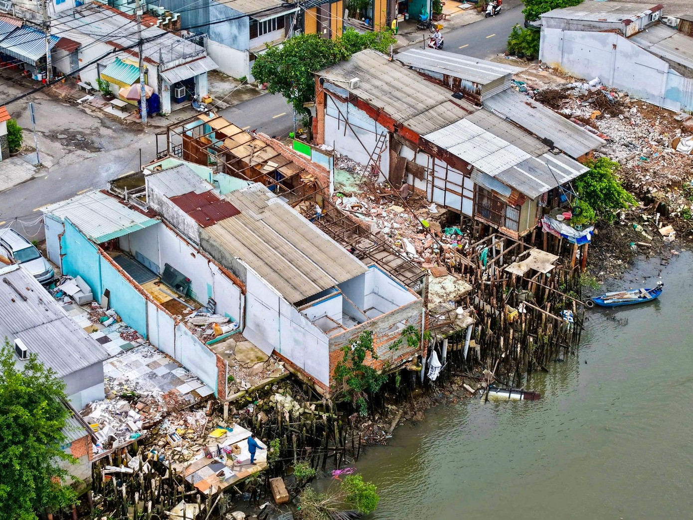 Các chính sách hỗ trợ người dân sau di dời 40.000 căn nhà ven kênh rạch ở TPHCM - Ảnh 9