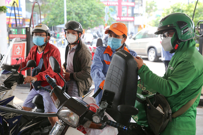 Giá xăng E5 RON92 tăng 6 đồng/lít - Ảnh 1