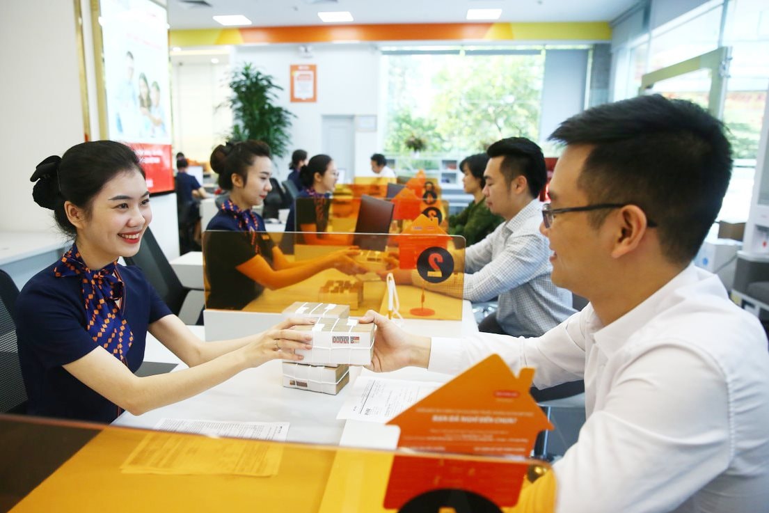 Lãi suất cho vay và nợ xấu được dự báo tiếp tục giảm - Ảnh 1