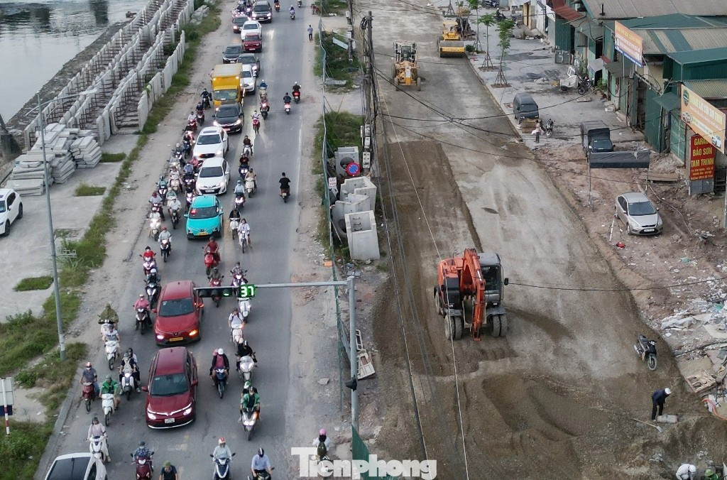 Dự án mở rộng đường Tam Trinh chậm tiến độ 7 năm, thi công 'xôi đỗ', gây ùn tắc kéo dài - Ảnh 8