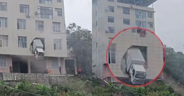 Xe tải đâm xuyên tường tầng 2 tòa nhà, hình ảnh đầu xe mắc kẹt giữa không trung gây sốc