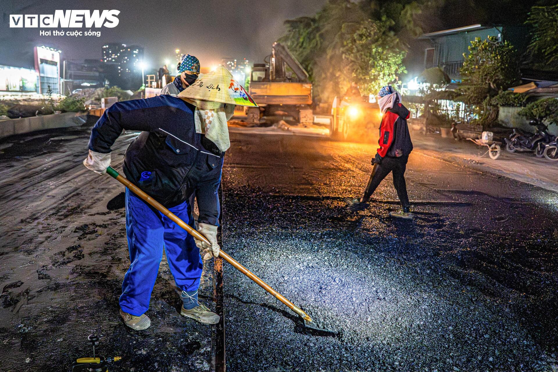 Vành đai 2,5 Hà Nội sáng đèn suốt đêm chạy đua về đích - Ảnh 8