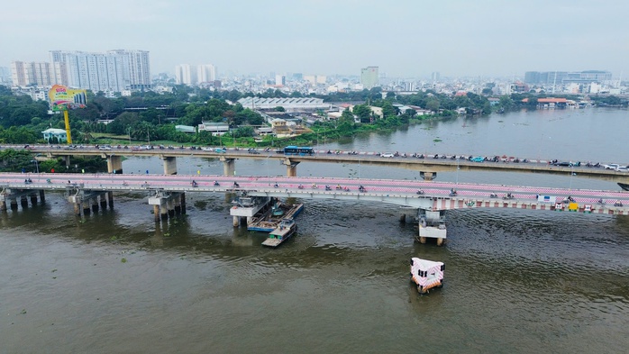 Kỳ tích Việt Nam - Cầu vượt sông bỗng cao thêm 1,08 m, chính thức thông xe trở lại hôm nay - Ảnh 2