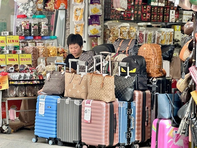 Giải 'nút thắt' nâng ngưỡng doanh thu chịu thuế - Ảnh 1