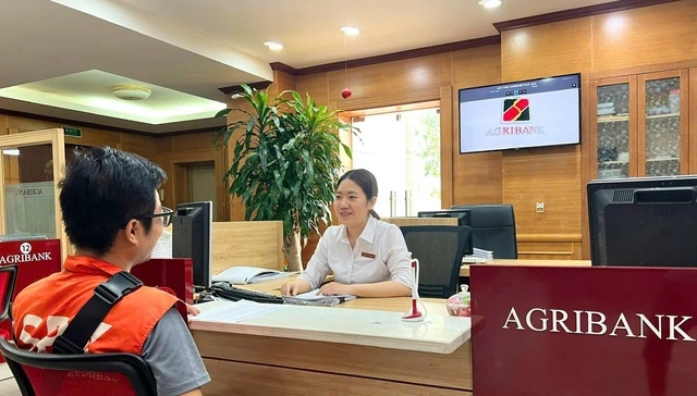 Agribank giảm lãi suất vay 2% cho khách hàng bị ảnh hưởng bão lũ - Ảnh 1
