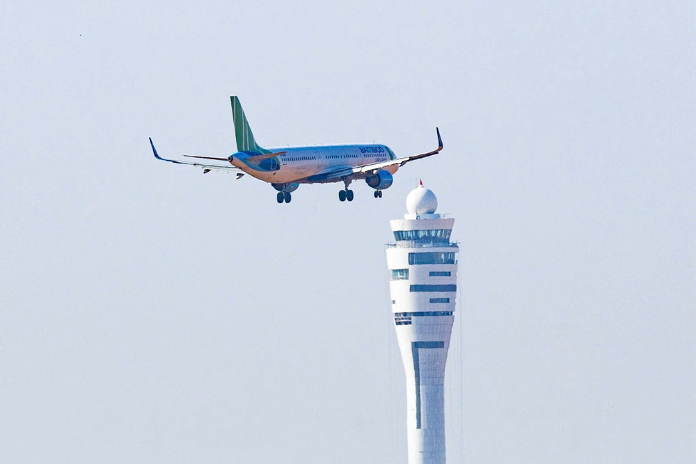 Cận cảnh chuyến bay đầu tiên của Bamboo Airways đến sân bay Long Thành - Ảnh 1